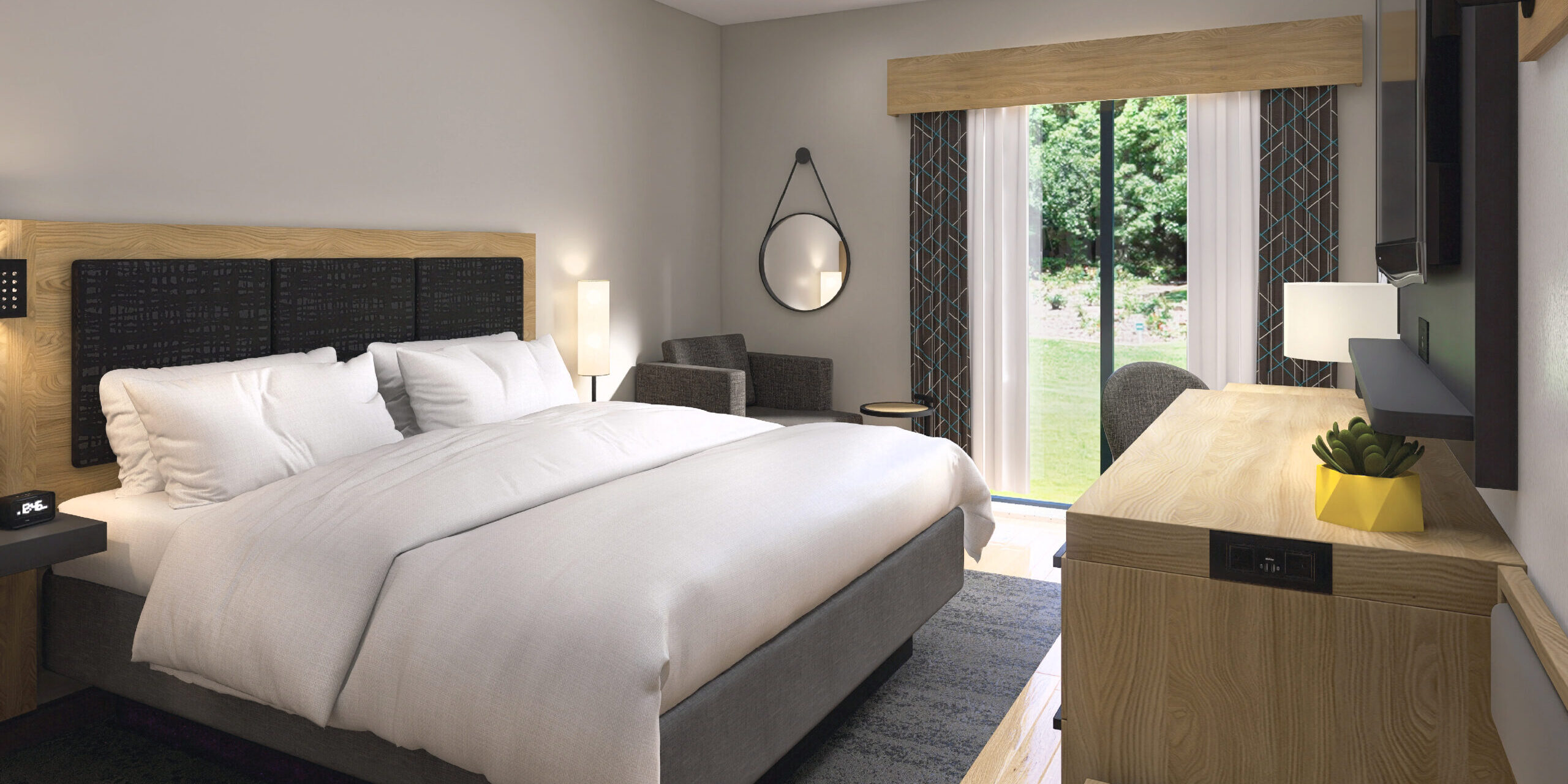 renovated guest room with one king bed