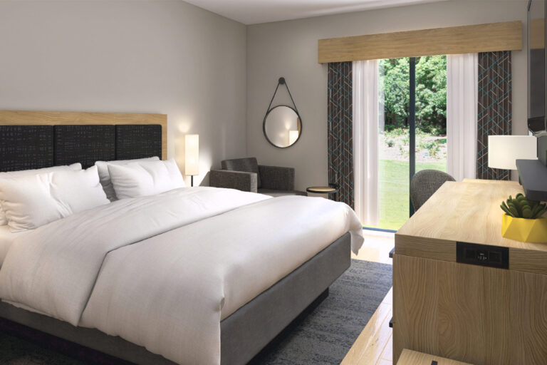 renovated guest room with one king bed