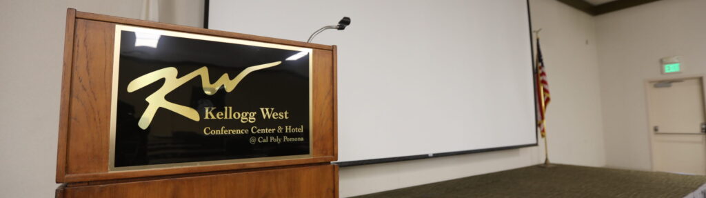 wooden speaker podium on stage in auditorium