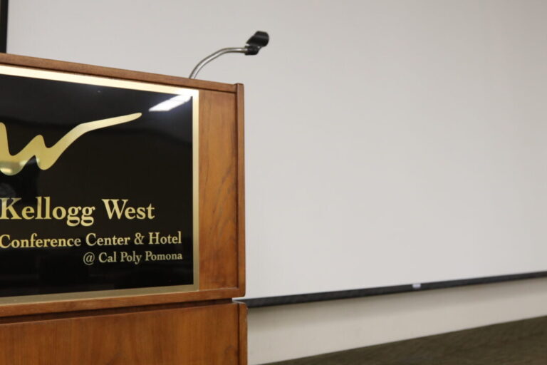 wooden speaker podium on stage in auditorium