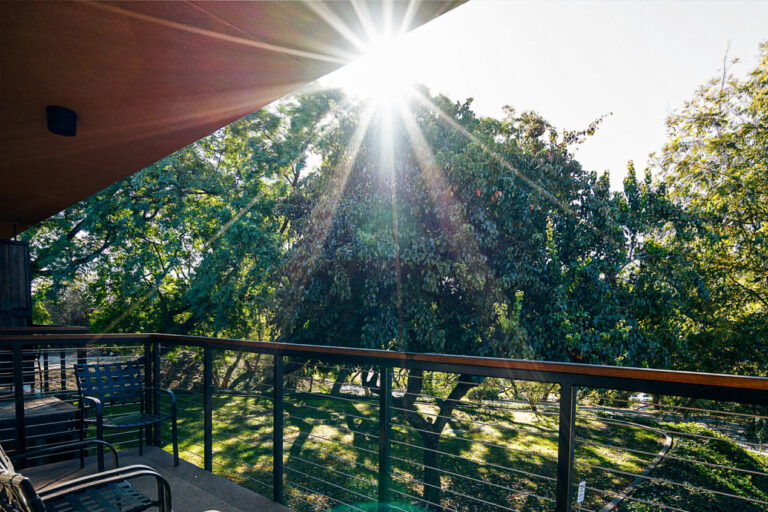 Balcony view with sun flare