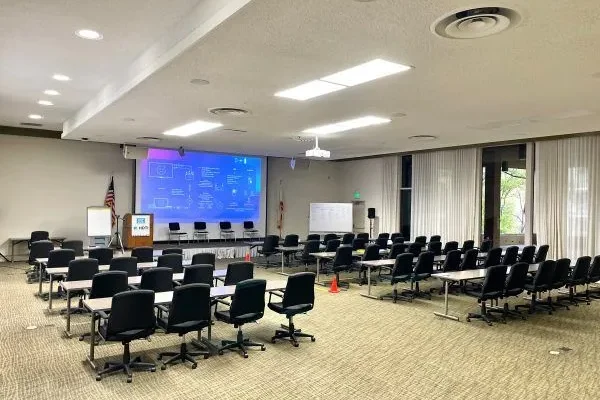 auditorium setup for meeting with projector screen