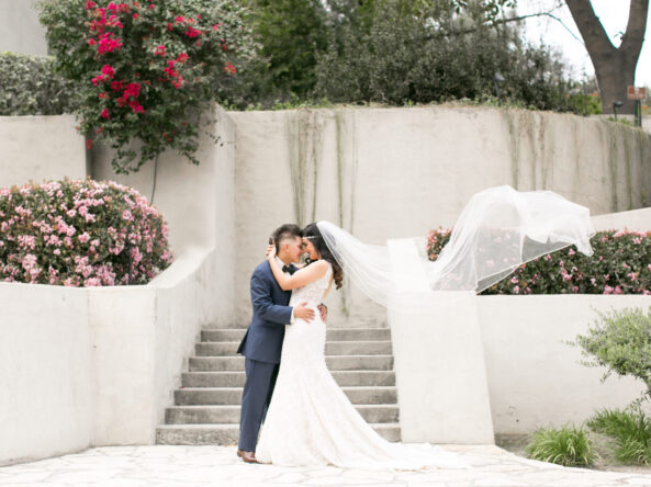 bride and groom embrace at Kellogg House