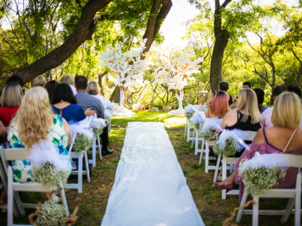 ceremony site outside on grassy knoll by Kellogg West